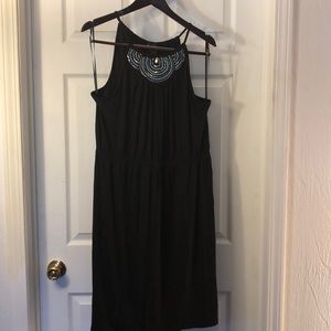 Knee length black 14/16 dress with needed neckline